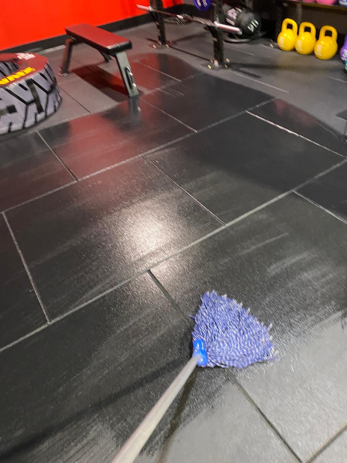 Gym floor mopping during commercial clean
