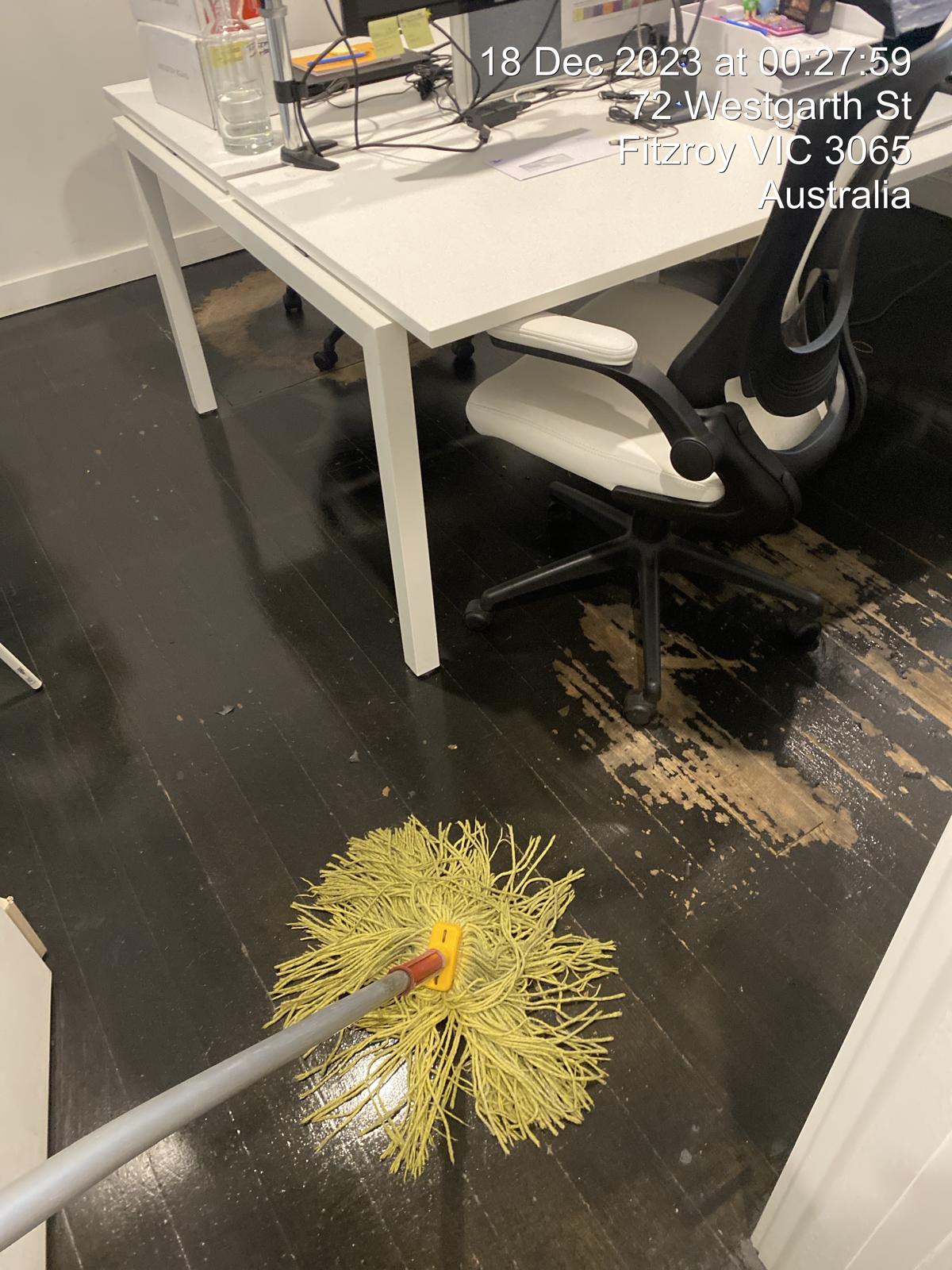 Office floor being mopped during a commercial clean